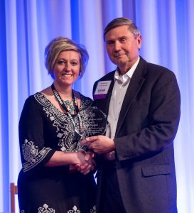 Katie Grinstead is the 2015 DBA Advocate award winner. Pictured with Gary Sipiorski of Vita Plus.