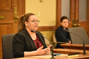 Rachel Harmann testifies before legislators in favor of Farm Bureau Health Plans. 