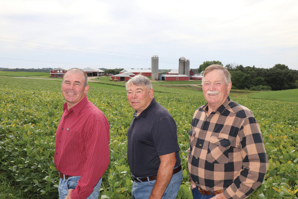 Mark, Curtis and Scott Noll on their family farm.