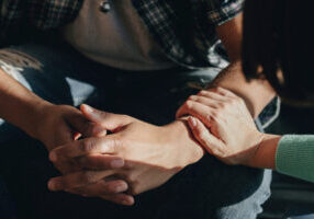 People support each other in a rehab session